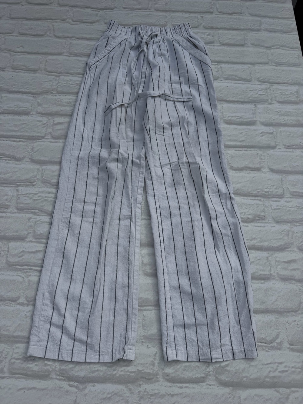 Sienna Sky White Pants with Black Vertical Stripes